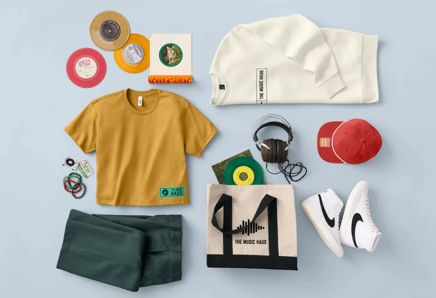 A branded merchandise kit laid out flat — the kind of curated gift selection recipients choose from in a corporate gifting program.
